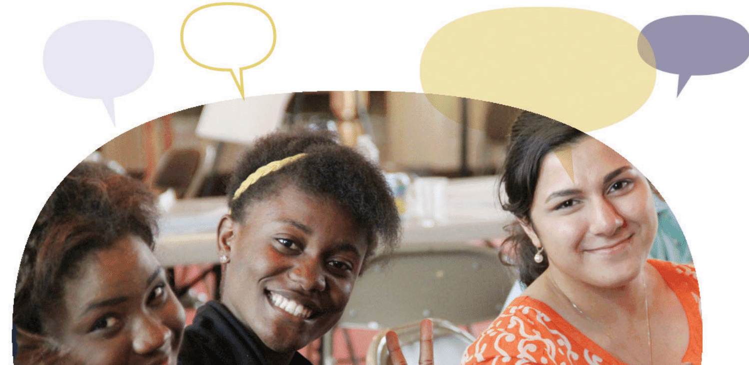 Three young people are sitting together, smiling and facing the camera, with colorful speech bubbles floating above them. The setting appears to be informal, possibly a community gathering or workshop.